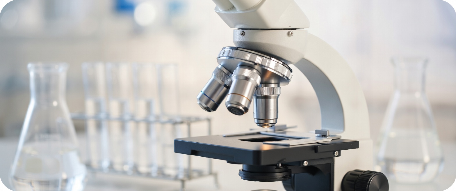 Laboratory microscope with glassware